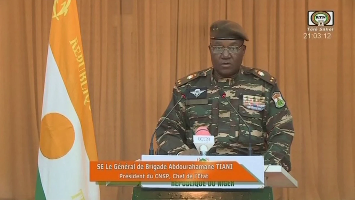 This video frame grab image obtained by AFP from ORTN - Télé Sahel on August 19, 2023 shows Niger's new military ruler General Abdourahamane Tiani, reading a statement on national television. (AFP/ORTN - Télé Sahel)