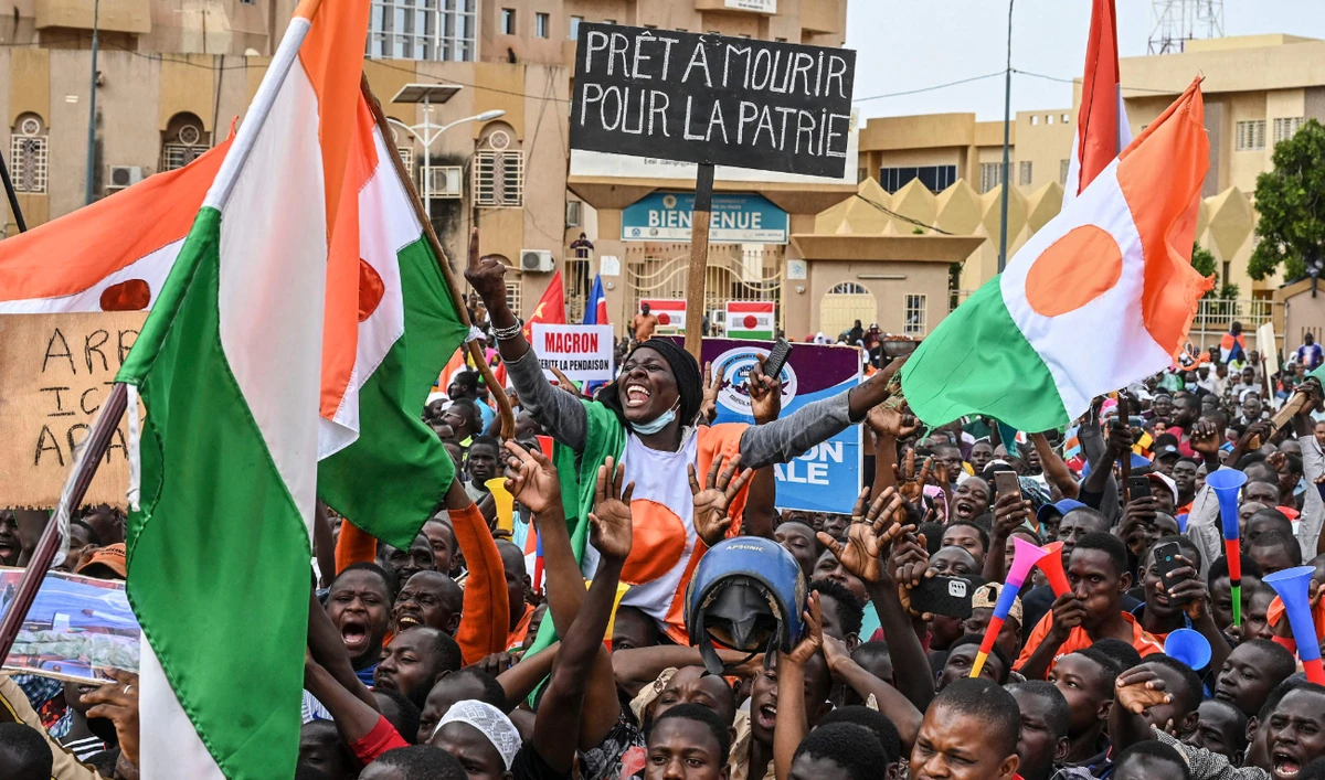 Demonstrators chanted slogans hostile to France and West African regional bloc ECOWAS, which is considering a potential military operation to reinstate the elected president. (AFP)