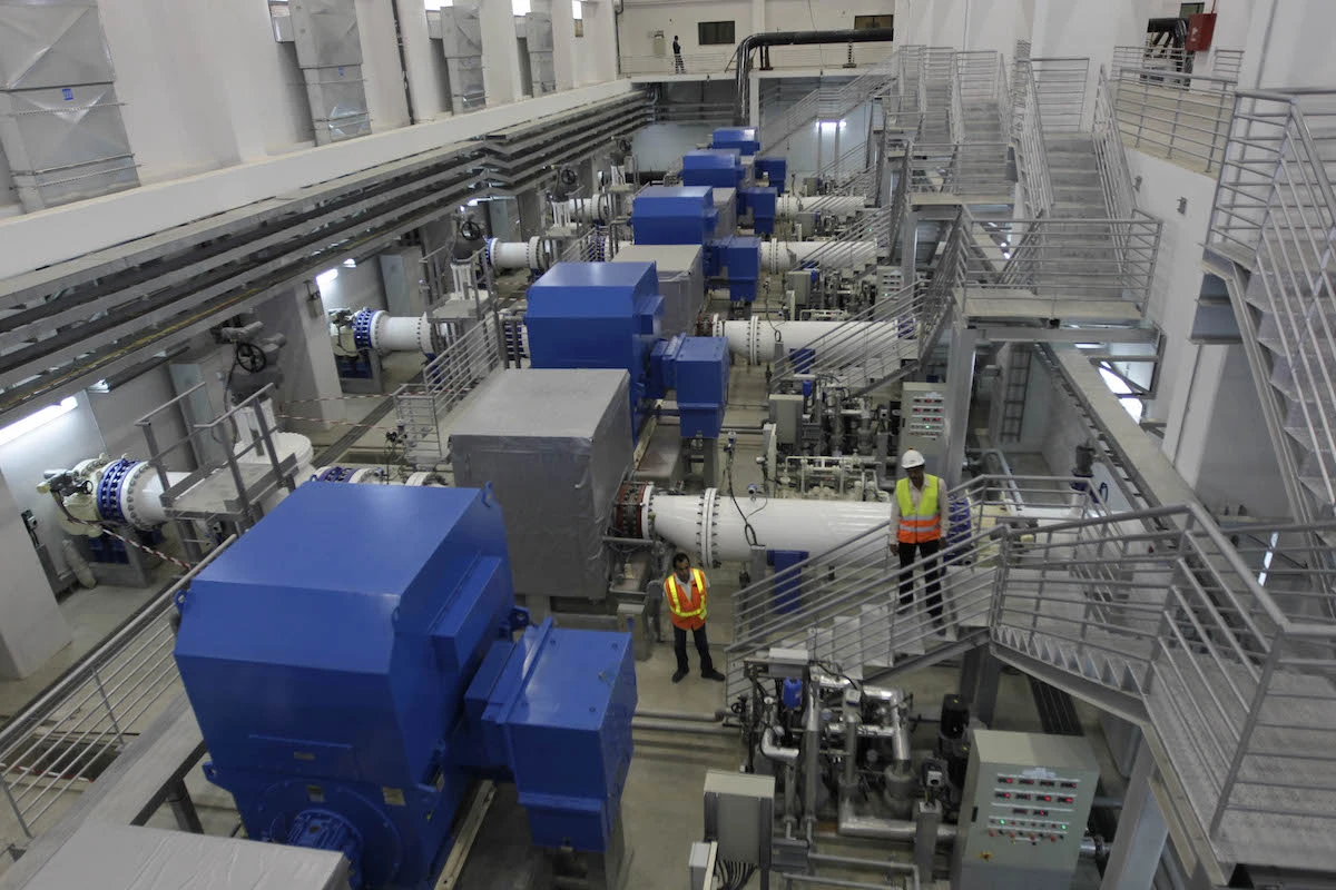 Employees pumping at a water experimental station in Amman. (File/AFP)
