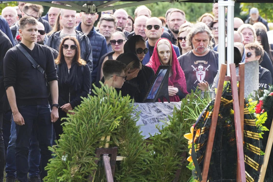People react by the coffin of the Wagner Group’s logistics chief Valery Chekalov, killed in the plane crash, during a funeral at the Severnoye cemetery in St. Petersburg, on Aug. 29, 2023. (AP)