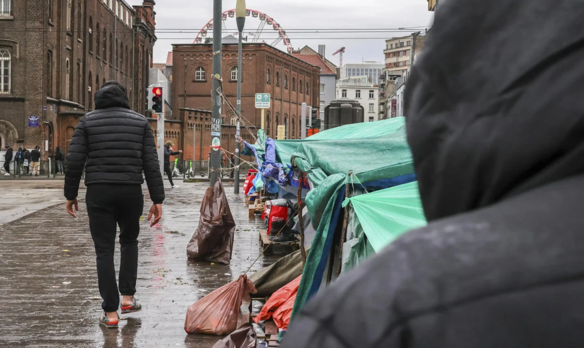Migrants gather outside of their tents in front of the Klein Kasteeltje center in Brussels. (AP/File)