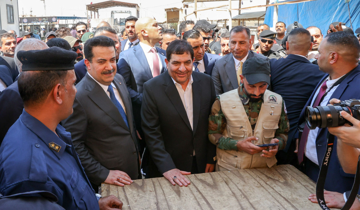 Iranian Vice President Mohammed Mokhber and Iraq’s Prime Minister Mohammed Shia Al-Sudani attend a ceremony on Saturday in Basra to lay the foundation stone for a railway connection project. (AFP)