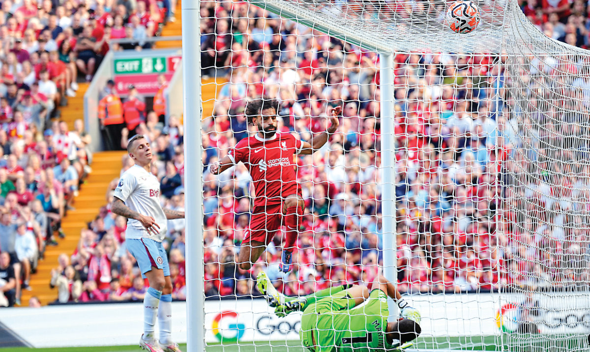 Mohamed Salah scores a goal against Aston Villa. The star remains indispensable if the Reds are to hold any hope of reeling in City for a top-flight title. (AP)