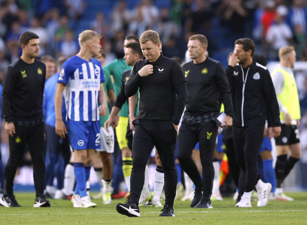 Newcastle United boss Eddie Howe leaves the pitch at the Amex Stadium after his side slumped to a 3-1 defeat at Brighton on Saturday — their third straight loss just four games into the new Premier League season. (Action Images via Reuters/Peter Cziborra)