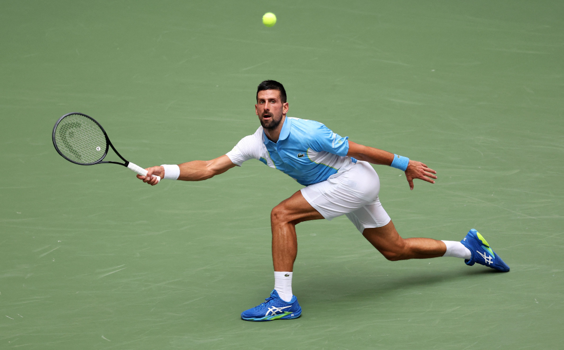 Novak Djokovic of Serbia plays a forehand during his men's singles quarterfinal against Taylor Fritz of the US at the 2023 US Open at the USTA Billie Jean King National Tennis Center. (AFP)