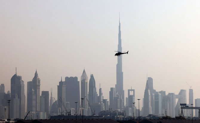 A helicopter flies overhead on the first day of the SailGP Grand Prix Dubai competition, in the Gulf emirate, on November 12, 2022. (Photo courtesy: AFP/File)