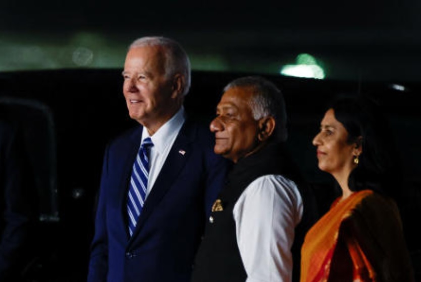 US President Joe Biden is welcomed by India's Minister of State for Road Transport and Highways Vijay Kumar Singh and Vani Sarraju Rao, Joint Secretary in the Ministry of External Affairs, as he arrives ahead of G20 Summit, in New Delhi on Sept. 8, 2023. (Reuters)