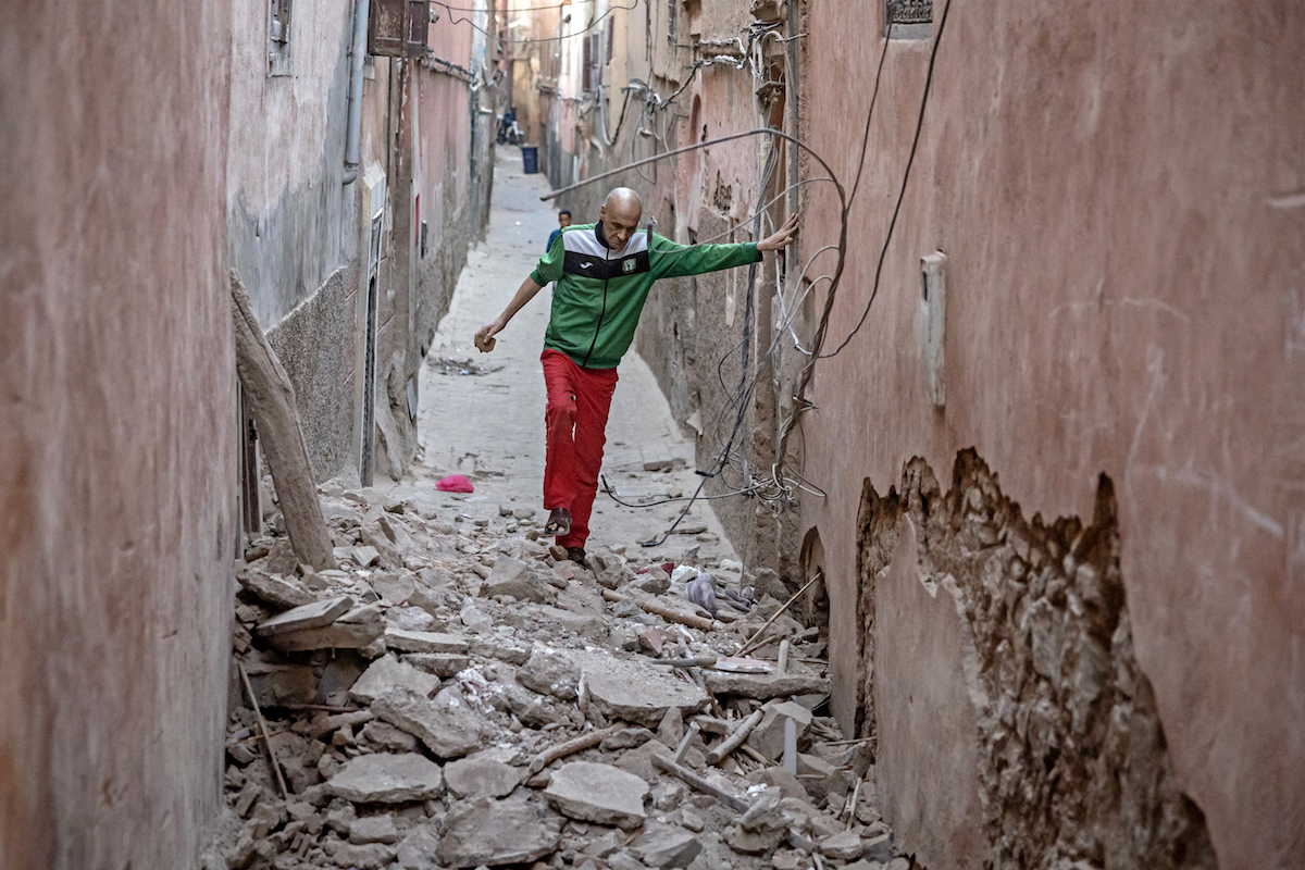 A resident walks through the rubble following a 6.8-magnitude quake in Marrakesh. (File/AFP)