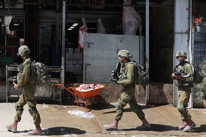Israeli forces shot dead a Palestinian teenager Saturday at a refugee camp in the West Bank, the Palestinian health ministry said, in the latest violence to rock the occupied territory. (AFP/File)