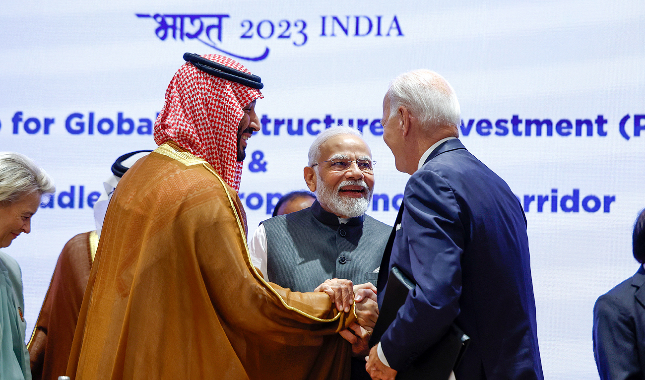 Saudi Arabia Crown Prince Mohammed bin Salman and US President Joe Biden shake hands next to Indian Prime Minister Narendra Modi on the day of the G20 summit in New Delhi on September 9, 2023. (REUTERS)