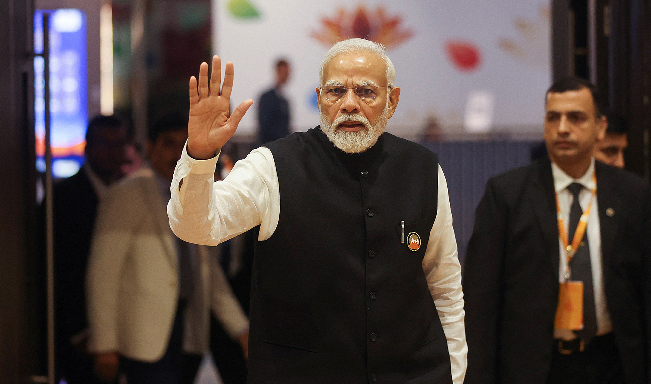 Indian Prime Minister Narendra Modi waves as he visits International Media Center, on the second day of the G20 summit in New Delhi, India, September 10, 2023. (REUTERS)