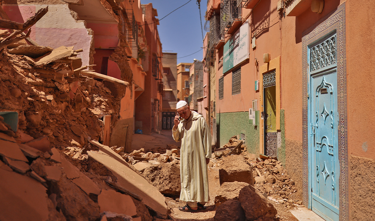 Mohamed Sebbagh, 66, stands in front of his destroyed house, in the aftermath of a deadly earthquake, in Amizmiz, Morocco, on September 10, 2023. (Photo courtesy: REUTERS)
