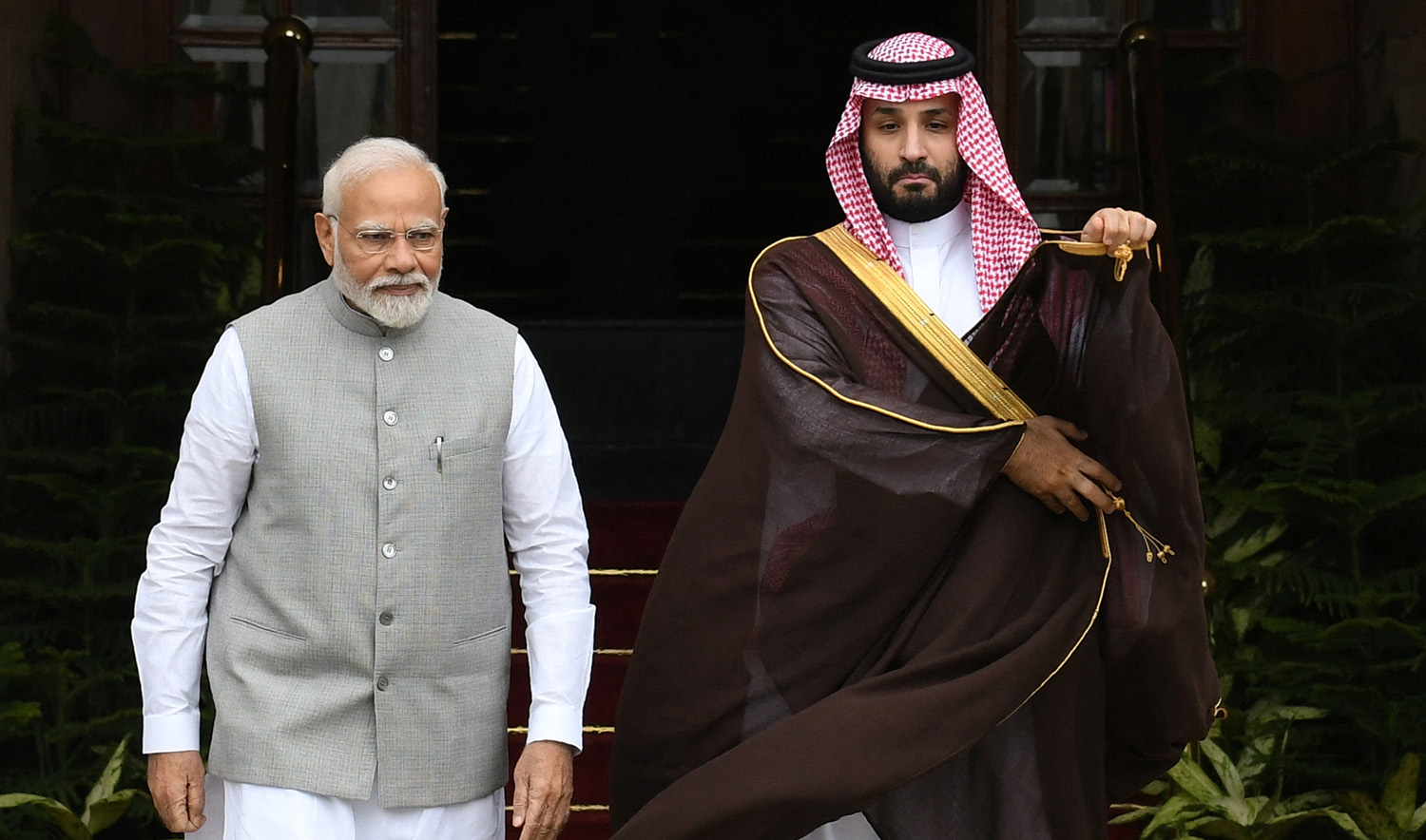 Saudi Arabia's Crown Prince Mohammed bin Salman and India's Prime Minister Narendra Modi arrive to attend a photo opportunity ahead of their meeting at Hyderabad House in New Delhi, India, on September 11, 2023. (REUTERS)