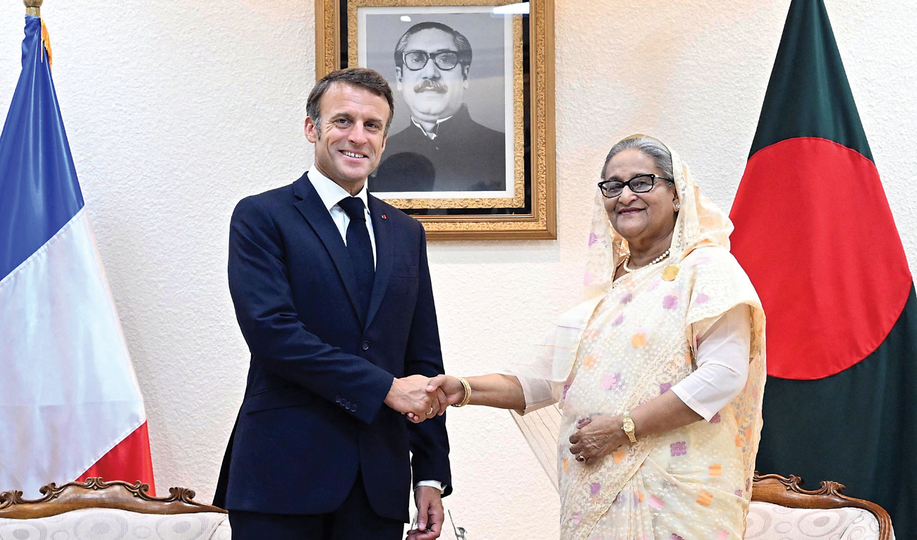 French President Emmanuel Macron meets Sheikh Hasina, Prime Minister of Bangladesh at her office in Dhaka on Monday. (Reuters)