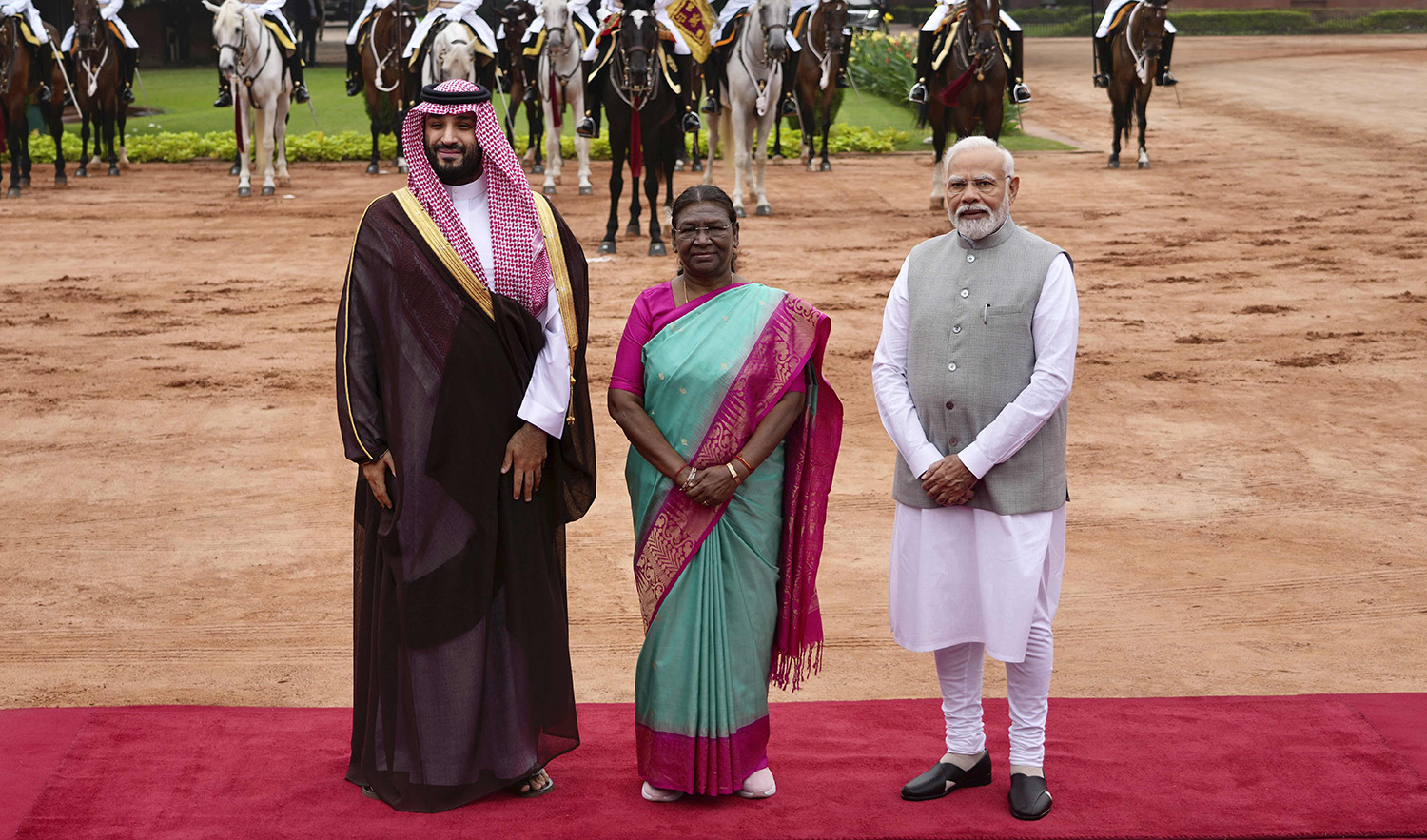 Saudi Crown Prince Mohammed bin Salman (L) poses with Indian President Droupadi Murmu, center, and Indian Prime Minister Narendra Modi during a ceremonial reception upon his arrival at the Indian presidential palace, in New Delhi, India, on September 11, 2023. (AP)