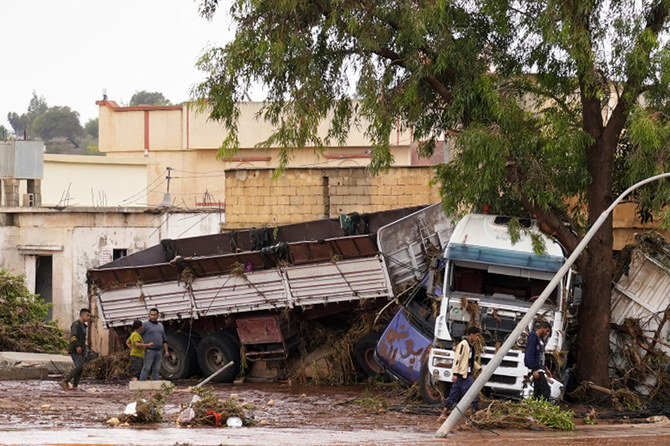 This handout picture provided by the office of Libya's Benghazi-based interim prime minister on September 11, 2023 shows a view of a trailer truck crashed into a tree in the eastern city of Benghazi in the wake of the Mediterranean storm "Daniel". (AFP)
