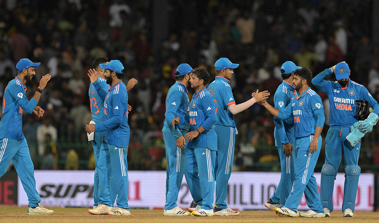 India's team celebrates the win against Sri Lanka at the end of the Asia Cup 2023 Super Four one-day international (ODI) cricket match between India and Sri Lanka at the R. Premadasa Stadium in Colomboon September 12, 2023. (AFP)