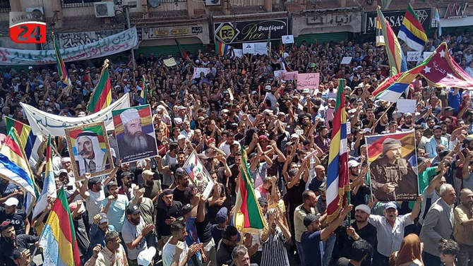 Three protesters were wounded by gunfire Wednesday while trying to weld shut a branch of Syria’s ruling Baath party in a southern province hit by nearly a month of anti-government demonstrations. (Reuters/File)