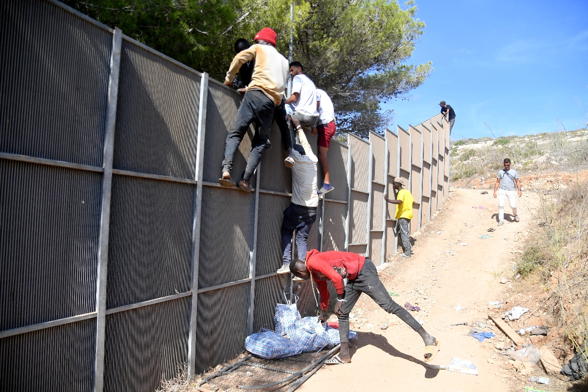 The number of migrants arriving in Italy after crossing on boats from North Africa has surged this year, at almost 124,000 since January -- up from 65,500 during the same period in 2022. (AFP)
