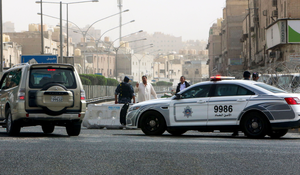 Kuwaiti police officers stand guard in Kuwait City. (AFP file photo)