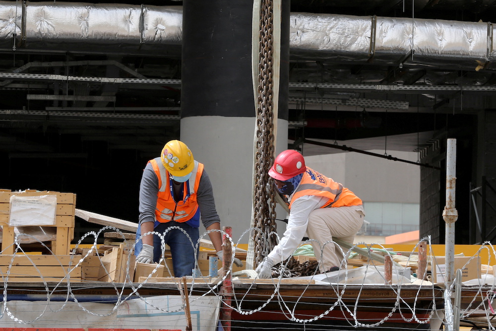 In this file photo, foreign workers are at their jobs on a construction site in Riyadh, Saudi Arabia on May 7, 2020. (Reuters)