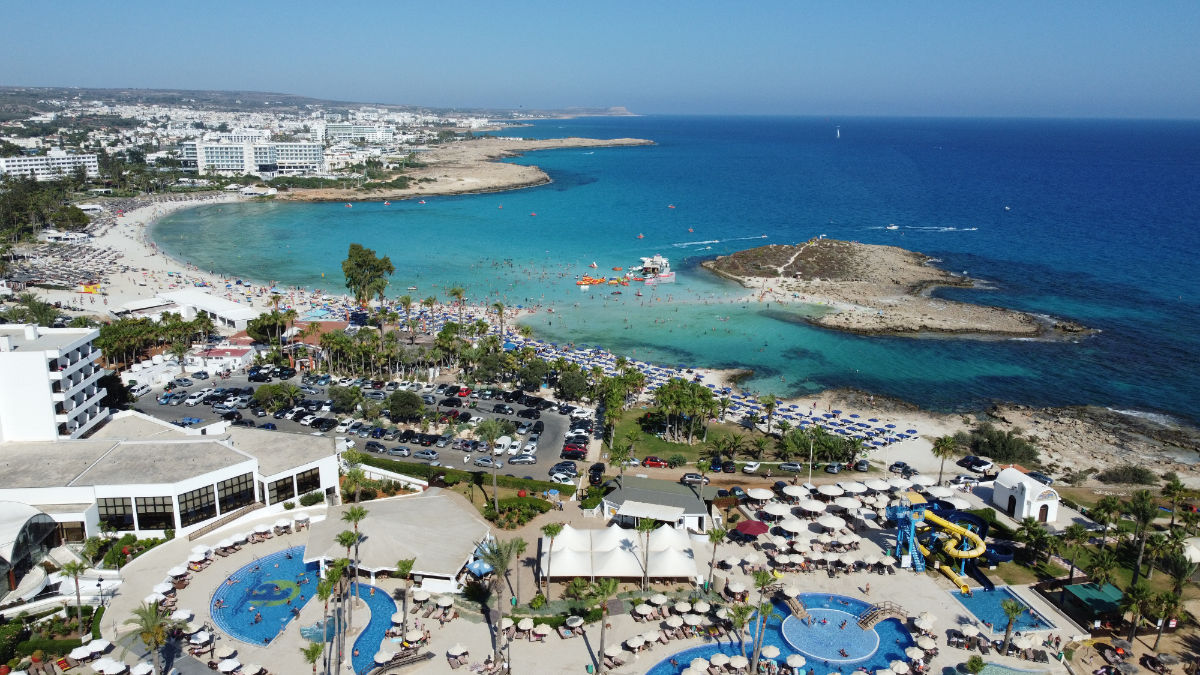 An aerial picture shows a view of Nissi Beach, in the Cypriot resort town of Ayia Napa, one of the Mediterranean island's top tourist destinations, on July 17, 2022. (AFP)