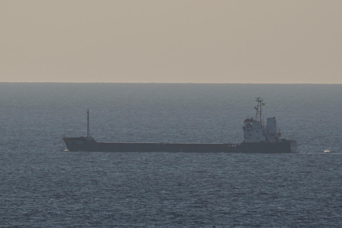Above, the Palau-flagged cargo vessel Resilient Africa loaded with grain, leaves the sea port of Chornomorsk near Odesa, Ukraine. (Reuters)