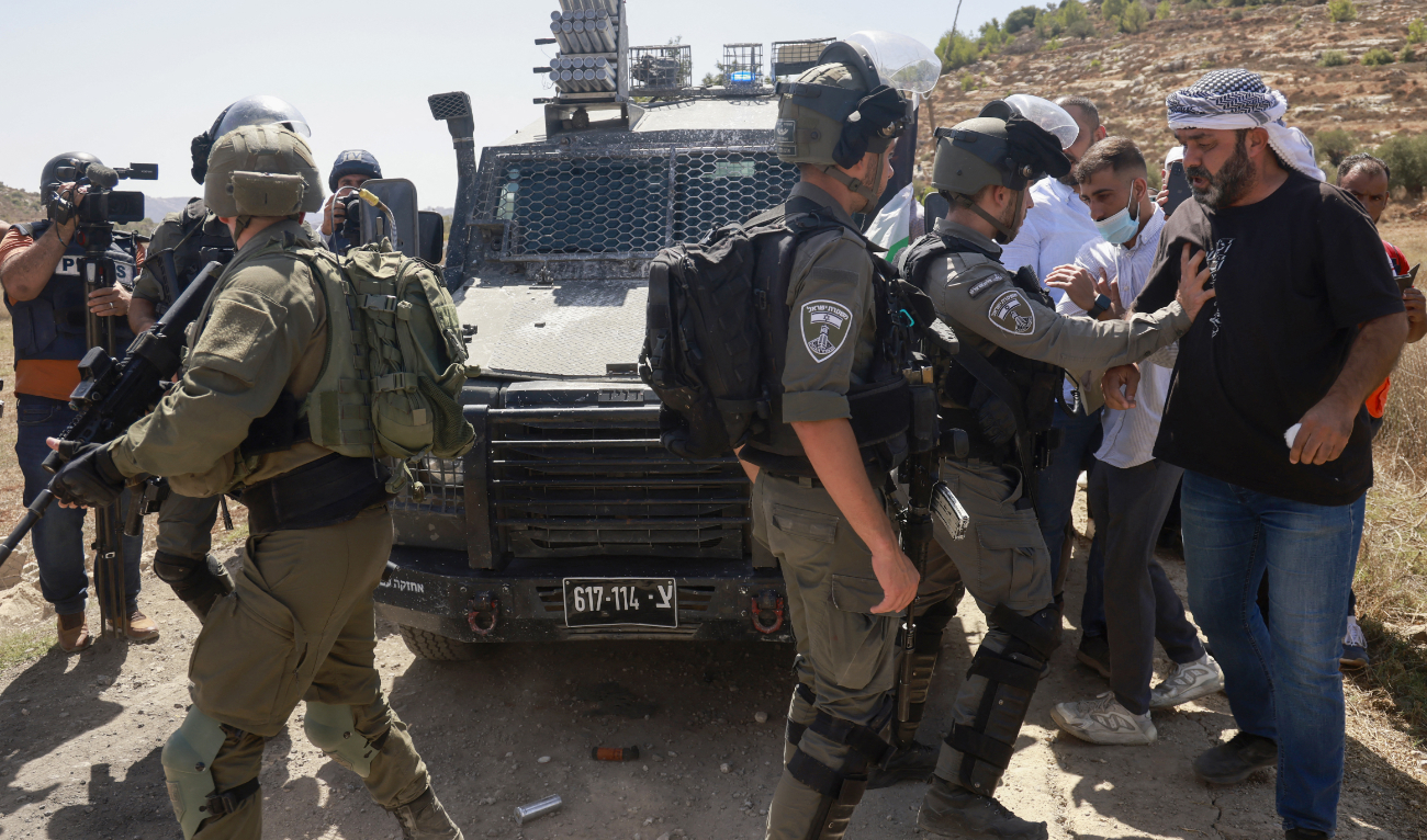 Israeli security forces argue with Palestinian protesters following a demonstration against the expropriation of Palestinian land by Israel in the village of Qaryut, south of Nablus city in the occupied West Bank on September 15, 2023. (AFP/File)