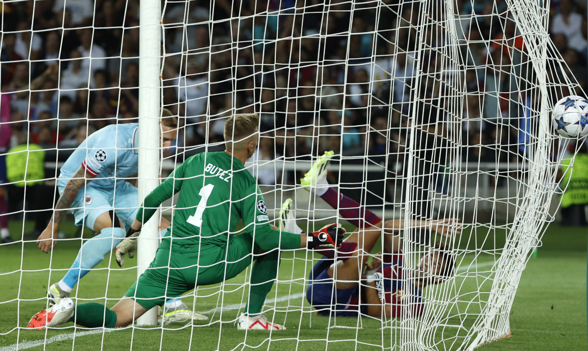Barcelona's Joao Felix, right, scores his side's fifth goal during the Champions League Group H soccer match between Barcelona and Royal Antwerp at the Olympic Stadium of Montjuic in Barcelona Tuesday. (AP)