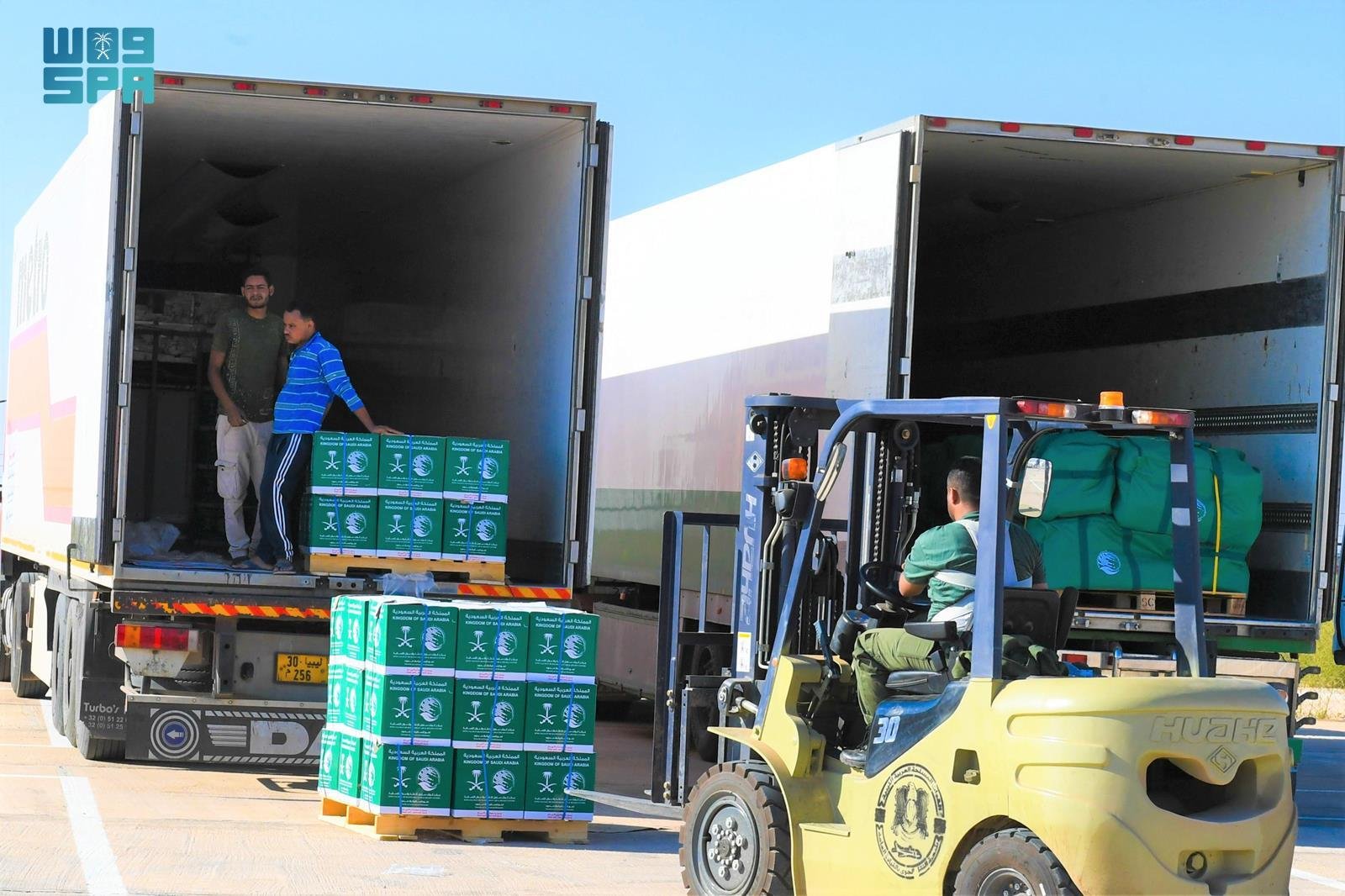A team from the Saudi aid agency KSrelief will oversee the distribution of aid with the Libyan Red Crescent. (SPA)