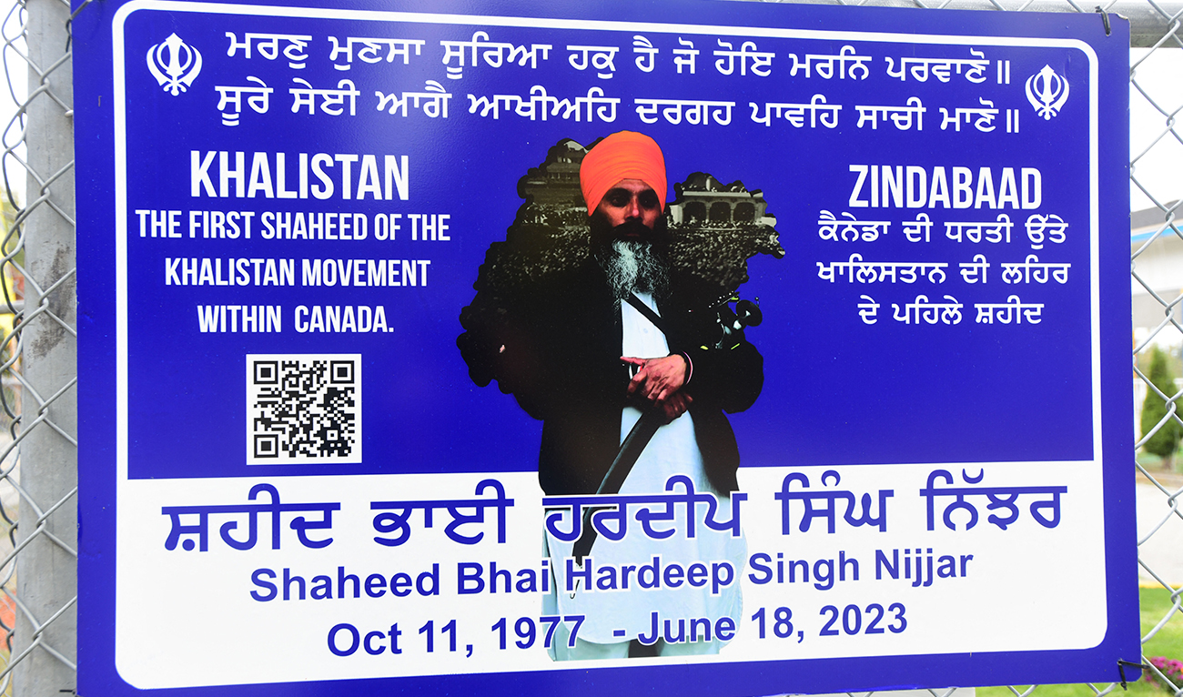 A poster of the former Gurdwara President Hardeep Singh Nijjar is displayed on a fence outside the Guru Nanak Sikh Gurdwara temple in Surrey, British Columbia, Canada, on September 19, 2023. (AFP/File)