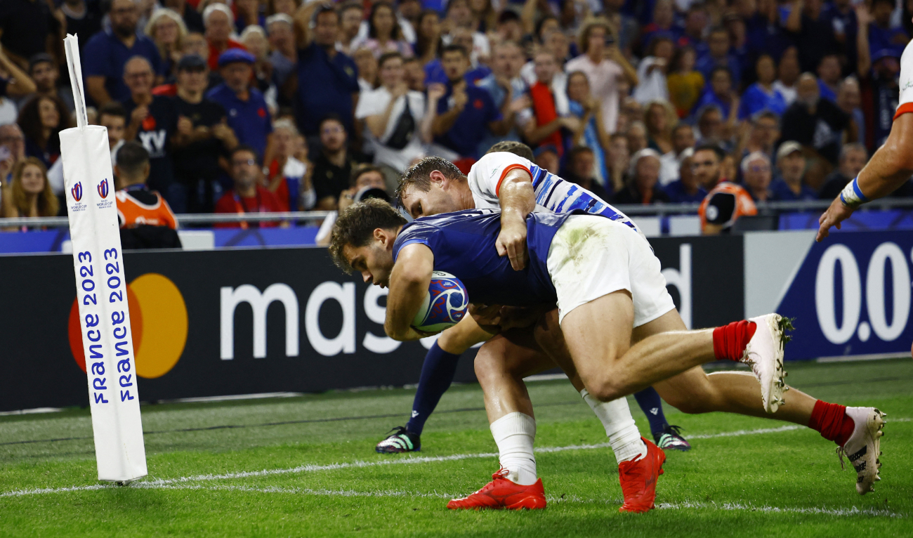 France's Damian Penaud scores their 10th try to complete his hat trick during the 2023 Rugby World Cup Pool A match against Namibia at Orange Velodrome, Marseille, on Thursday. (Reuters)