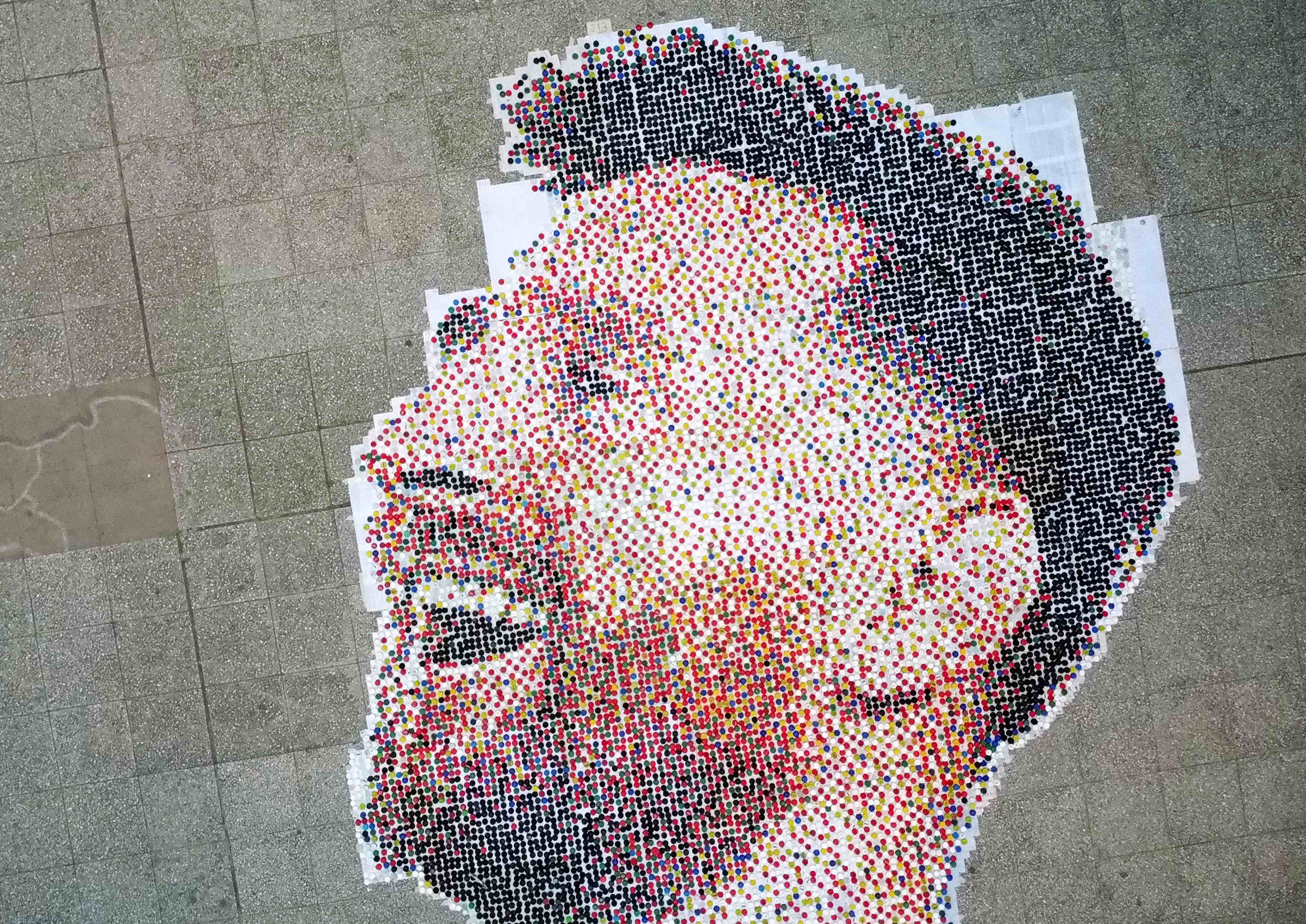 A mural made by high school students with plastic bottle caps depicts Argentina's soccer superstar Lionel Messi, in Grand Bourg, nine months after Argentina won the soccer World Cup Qatar 2022, on the outskirts of Buenos Aires on Sept. 19, 2023. (Reuters)