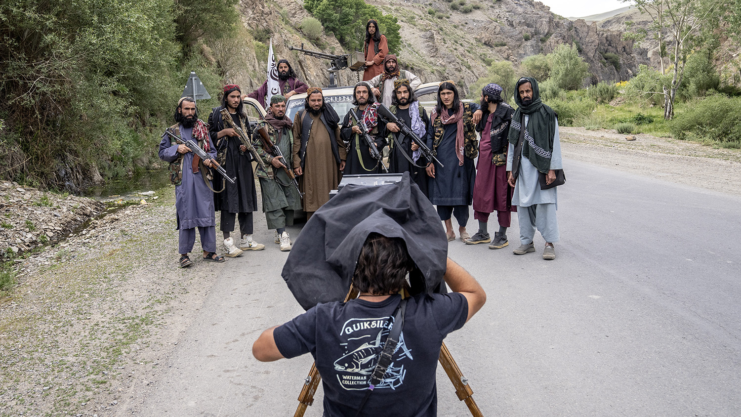 Associated Press photographer Rodrigo Abd takes a portrait of Taliban fighters with a wooden box camera in Bamiyan, Afghanistan, on June 18, 2023. (AP)