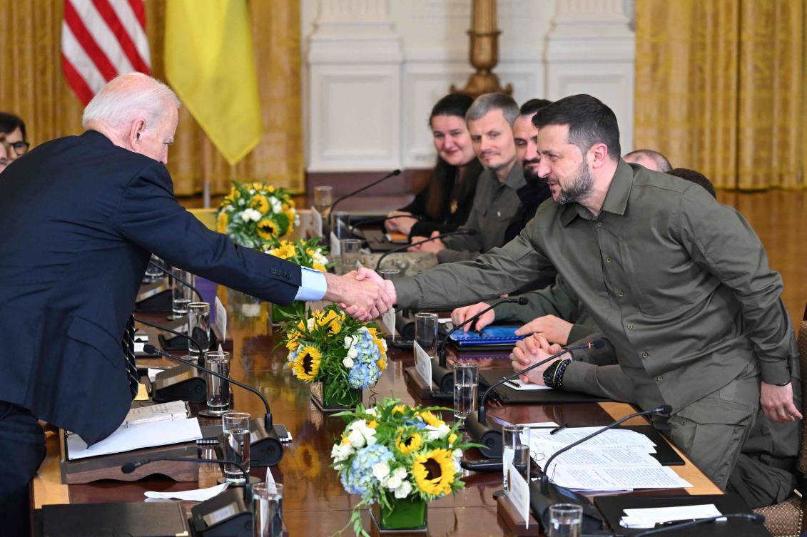 US President Joe Biden and Ukrainian President Volodymyr Zelensky shake hands during an expanded bilateral meeting in the East Room of the White House in Washington, DC. (File/AFP)
