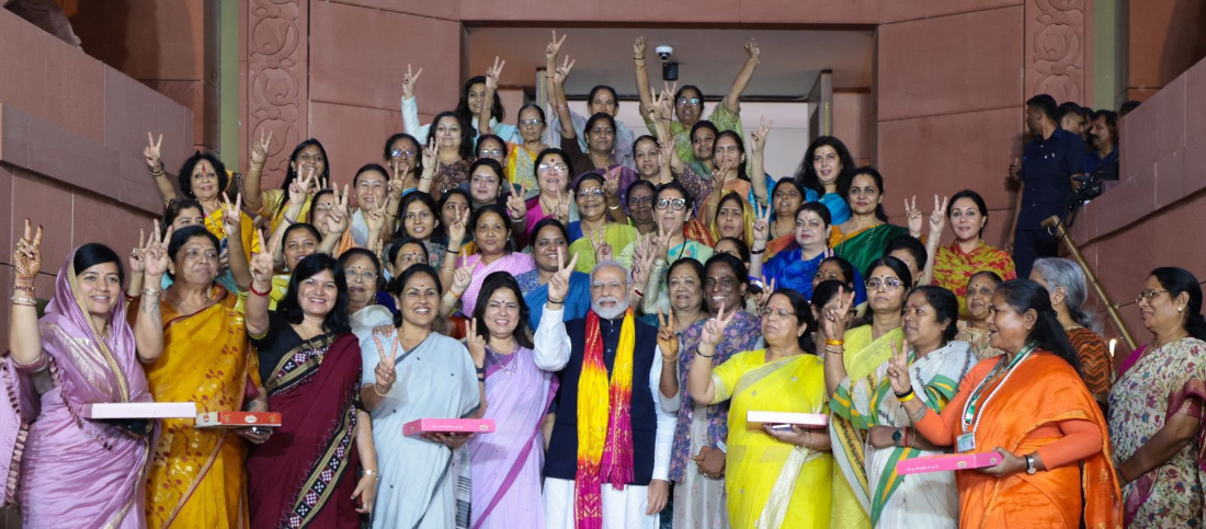 Indian Prime Minister Narendra Modi and women lawmakers welcome the passage of the Women’s Empowerment Reservation Bill by the lower house of Parliament in New Delhi. (India PM Office)