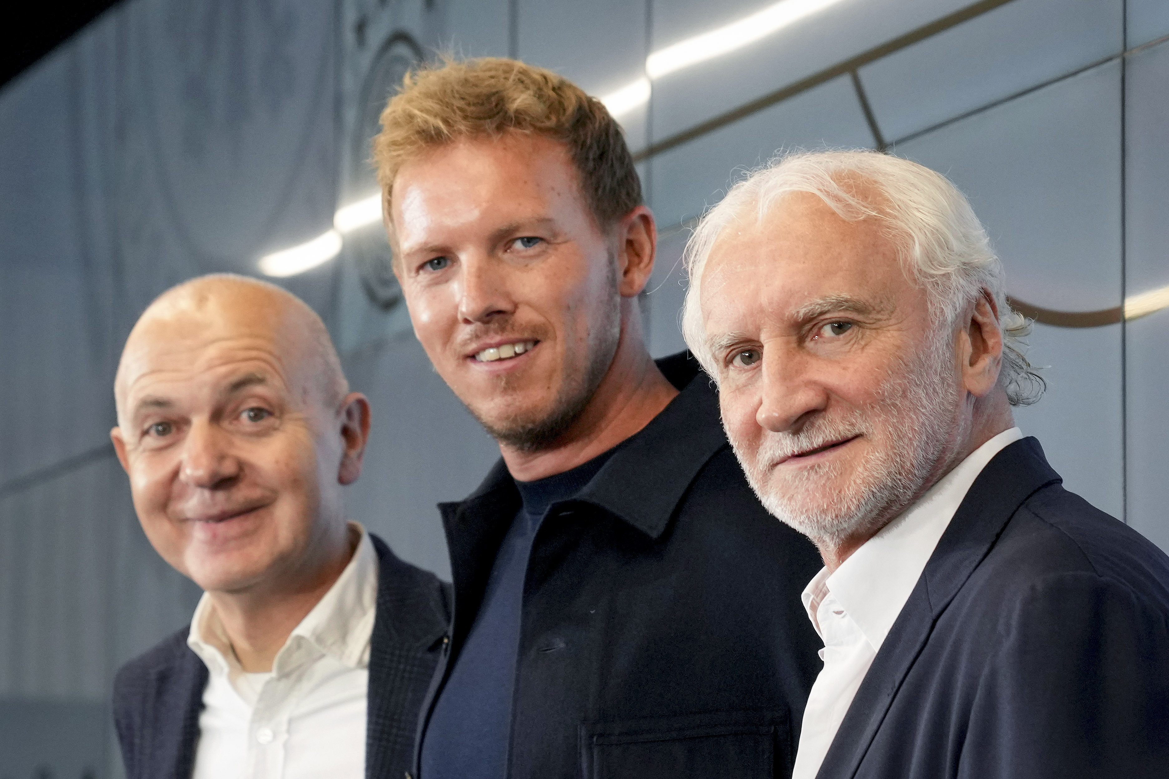 New coach of German national soccer team Julian Nagelsmann, center, president of German Football Federation Bernd Neuendorf, left, and sports director Rudi Moeller during a press conference in Frankfurt Friday. (AP)