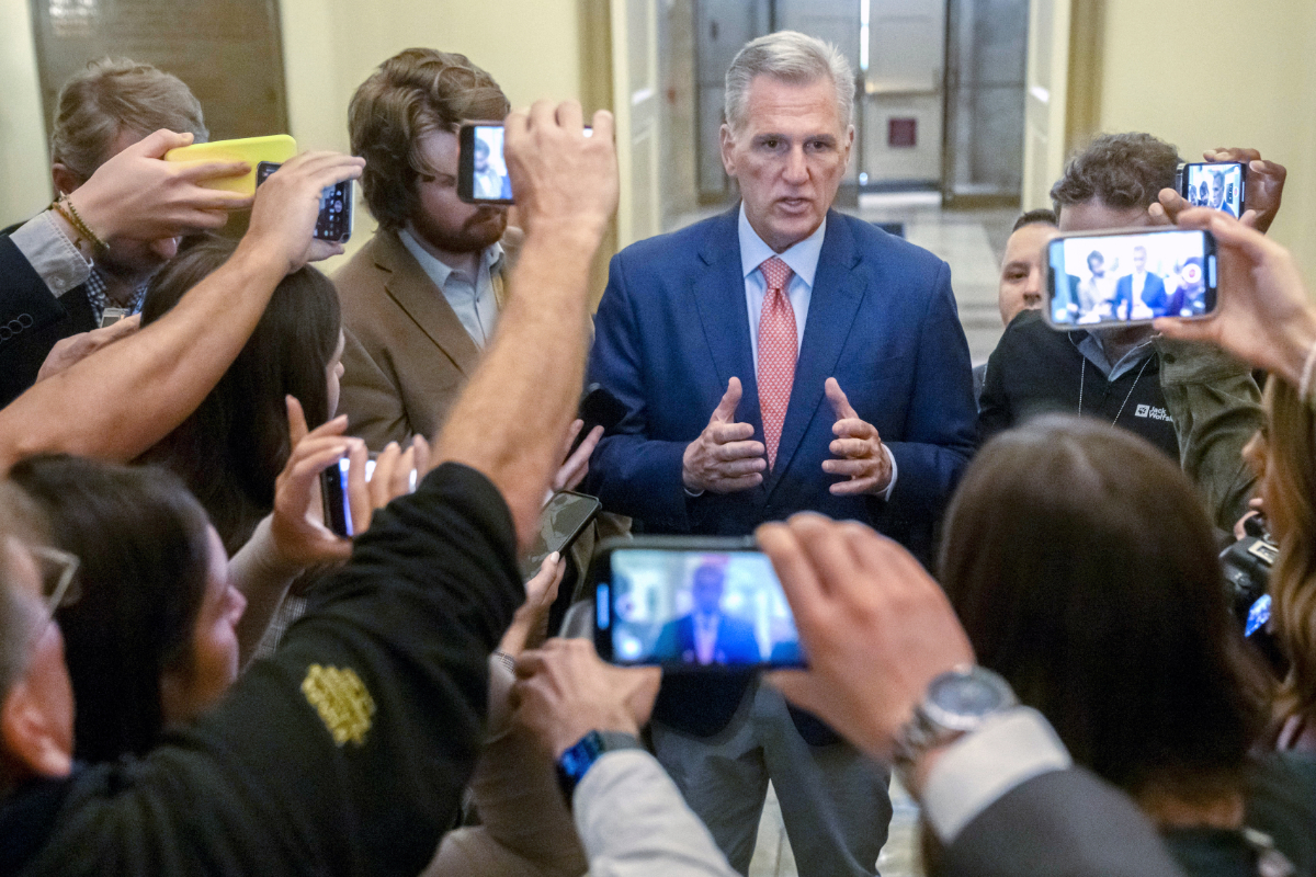 Speaker of the House Kevin McCarthy, R-Calif., is surrounded by reporters looking for updates on plans to fund the government and avert a shutdown, at the Capitol in Washington, Friday, Sept. 22, 2023. (AP)