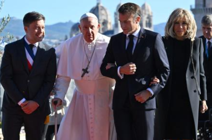 The Mayor of Marseille Benoit Payan looks on as Pope Francis and the wife of the French President Brigitte take the arm of French President Emmanuel Macron, upon the Pope’s arrival at the Palais du Pharo in Marseille on Sept. 23, 2023. (AFP)