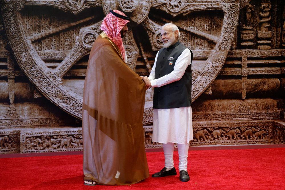 Saudi Crown Prince Mohammed bin Salman and India's Prime Minister Narendra Modi shake hands ahead of the G20 Leaders' Summit in New Delhi on Sept. 9, 2023. (AFP)