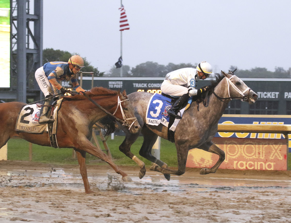 In this image provided by Equi-Photo, Saudi Crown, right, ridden by Florent Geroux, wins the Pennsylvania Derby horse race Saturday at Parx Racing in Bensalem, Pennsylvania. (AP)