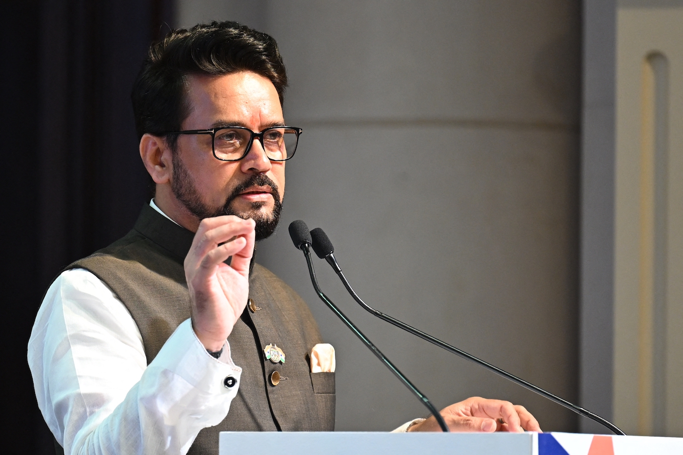 Indian Minister of Sports Anurag Singh Thakur delivers a speech during a send off ceremony for Indian athletes competing in the Hangzhou 2022 Asian Games. (File/AFP)