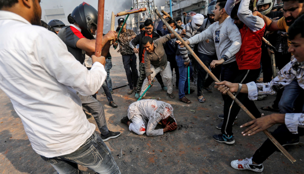A group of men in New Delhi chanting pro-Hindu slogans beat Mohammad Zubair, 37, who is Muslim, during protests sparked by a citizenship law in New Delhi. (Reuters)
