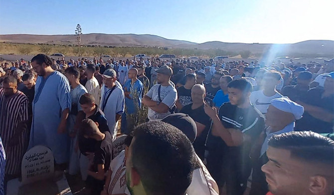 Mourners attend the funeral of Bilal Kissi, shot dead by the Algerian coast guard when he and a fellow jet skier strayed across the maritime border between Algeria and Morocco on August 31, 2023. (AFP/File)