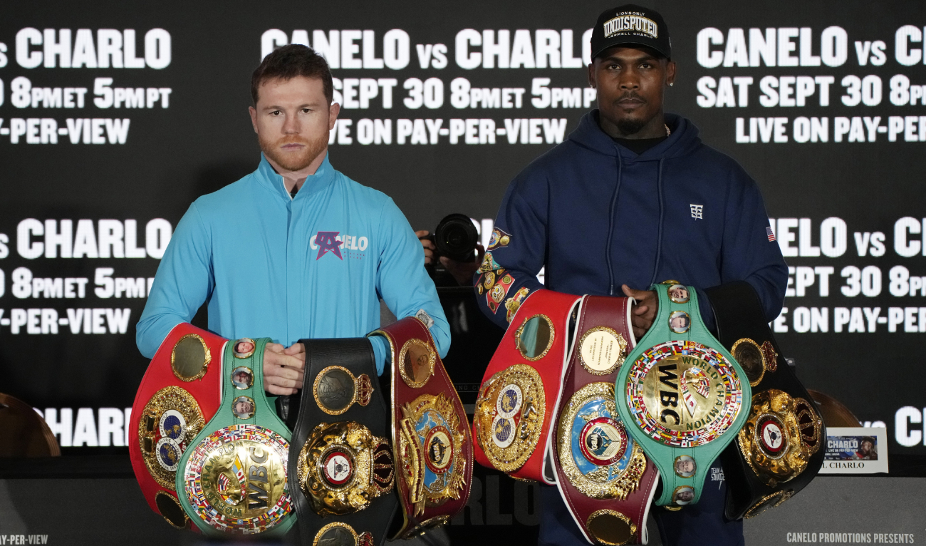 Canelo Alvarez, left, of Mexico, and Jermell Charlo pose during a news conference Wednesday in Las Vegas. The two are scheduled to fight in a super middleweight title boxing match Saturday in Las Vegas. (AP)