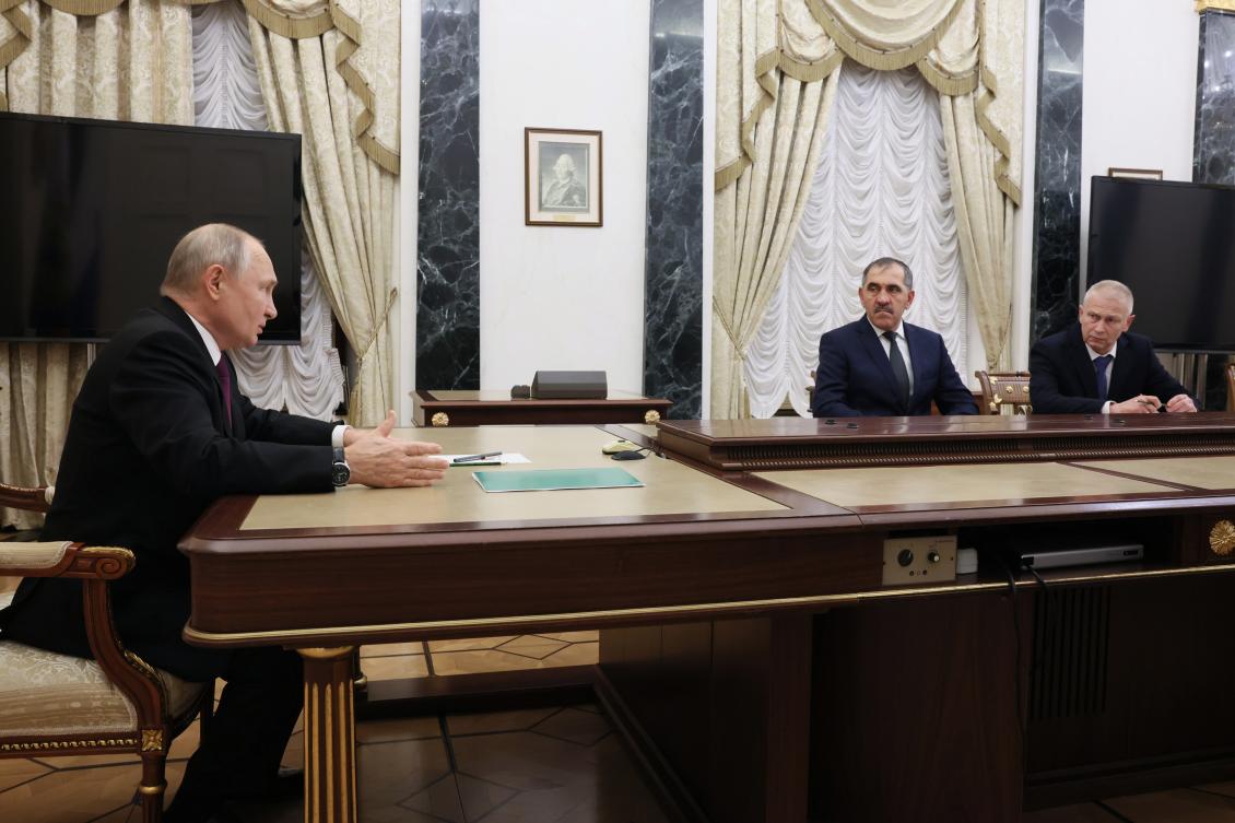 Russian President Vladimir Putin meets with Russian Deputy Defense Minister Yunus-Bek Yevkurov, second right, and Chairman of the St. Petersburg regional public organization "League for the Protection of the Interests of Veterans of Local Wars and Military Conflicts" retired Andrey Troshev in Moscow. (AP)