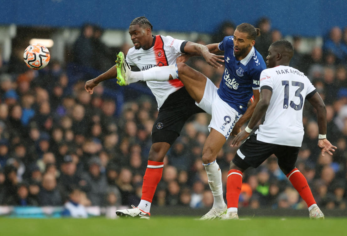 Everton’s Dominic Calvert-Lewin in action with Luton Town’s Teden Mengi and Marvelous Nakamba during their Premier League match at Goodison Park, Liverpool on Sept. 30, 2023. (Reuters)