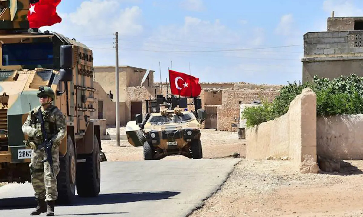 Turkish soldiers accompanied by armoured vehicles patrolling the city of Manbij in northern Syria. (AFP/File)