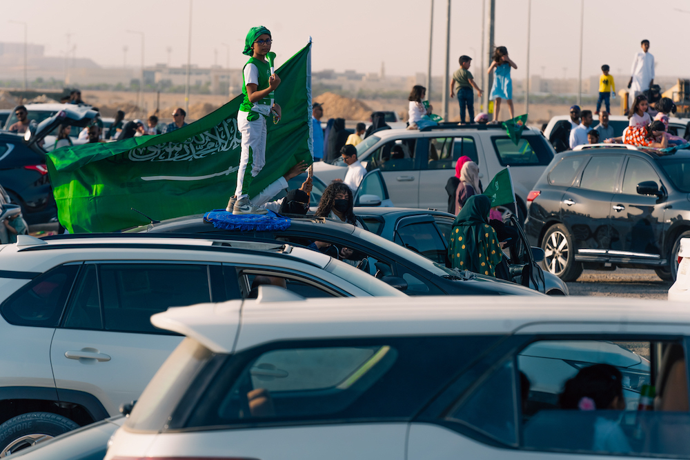Saudis across the Kingdom have been taking to flag-decked streets in their thousands on Saturday to celebrate the Kingdom’s 93rd National Day. (AN Photo/Huda Bashatah)
