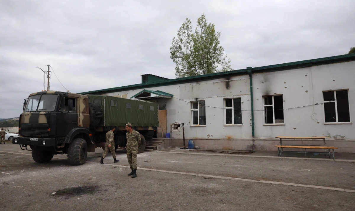 Azerbaijani soldiers stands in a street in Shusha, in Azerbaijan's controlled region of Nagorno-Karabakh, Sept. 23, 2023. (AFP)